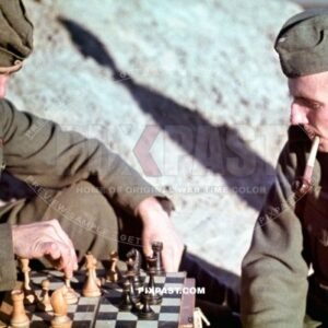 German army soldiers smoking pipe and playing chess. Ostfront ribbon. 8th Panzer Division. Russia August 1942. CHOLM