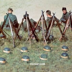 German army soldiers training with Kar98 rifles and yellow rubber band helmets. 8th Panzer Division. Russia August 1942