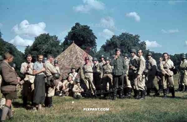German army soldiers training with tents in field beside Munich, Germany 1939