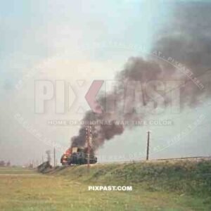 German army supply train burning after Russian air force aerial attack. Poland 1944.