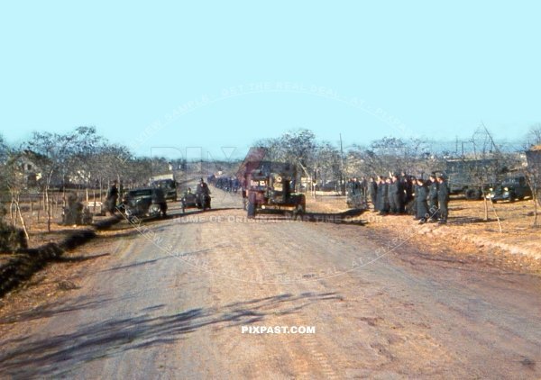 German artillery cannon with Famo halftrack.Kradmelder. medical soldiers Appell. Sevastopol KRIM Russia 1942