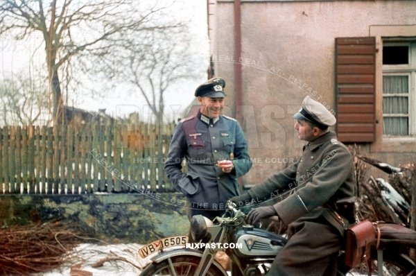 German artillery officer talking with motorbike Kradmelder on Westfront France German border 1939. 14th infantry division