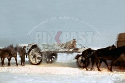 German artillery sFH 18, 150 mm Howitzer in camouflage pulled by horse into Stalingrad Russia 1942. 297 Infantry Division