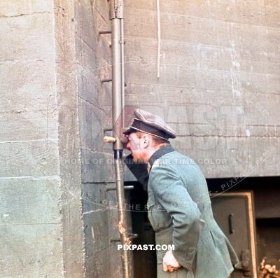 German infantry officer observing french position from German Bunker Westwall. Germany 1939. 14th infantry division. Fernglas