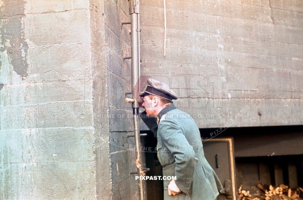 German infantry officer observing french position from German Bunker Westwall. Germany 1939. 14th infantry division. Fernglas