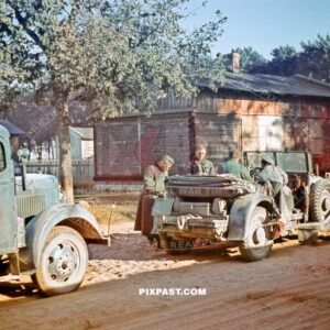 German invasion force in Poland 1939. Resting beside polish farm before continue attack. Horch and Opel Truck.