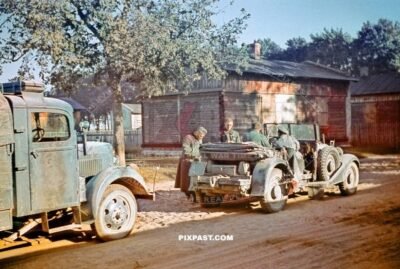 German invasion force in Poland 1939. Resting beside polish farm before continue attack. Horch and Opel Truck.