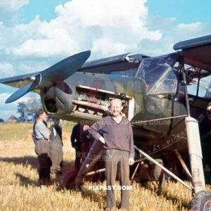 German medical orderly with Luftwaffe Fieseler Fi 156 Storch red cross medial ambulance plane. Russia 1941