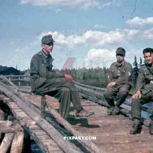 German mountain troops Gebirgsjaeger summer 1944 Finland, river bridge, pipe, smoking.