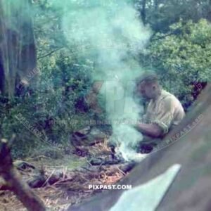 German soldier camping in French woods 1940. Zeltbahn and drying out sheets.