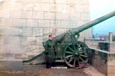 German soldier visiting the 2 6inch (200 Pound) Model 1904 Siege Gun in Monument de la Paix at Verdun France 1940