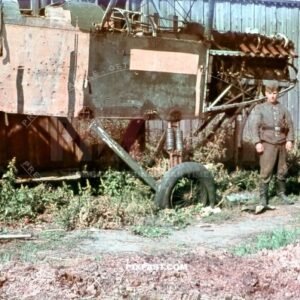 German soldier with Russian Polikarpov R5 Soviet reconnaissance bomber aircraft. Ukraine summer 1942.
