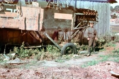 German soldier with Russian Polikarpov R5 Soviet reconnaissance bomber aircraft. Ukraine summer 1942.