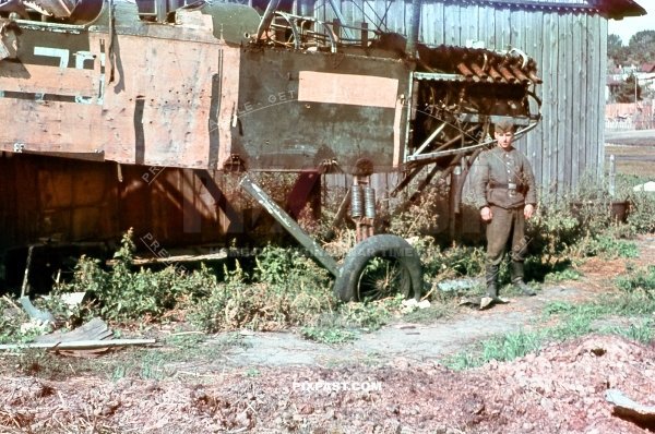 German soldier with Russian Polikarpov R5 Soviet reconnaissance bomber aircraft. Ukraine summer 1942.