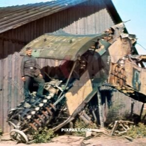 German soldier with Russian Polikarpov R5 Soviet reconnaissance bomber aircraft. Ukraine summer 1942