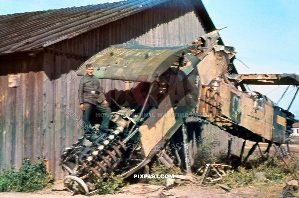German soldier with Russian Polikarpov R5 Soviet reconnaissance bomber aircraft. Ukraine summer 1942