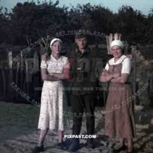 German soldier with local village women, 10th Motorised infantry division repair werkstatt Bryansk 1941, binoculars,