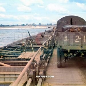 German soldiers in a captured Russian GAZ army truck crossing German river pontoon bridge in Ukraine 1942. Mg34 flak gun