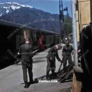 German soldiers surrendering weapons beside General Albert Kesselrings private train, Saalfelden Austria 1945
