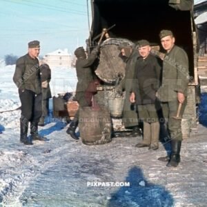 German soldiers transporting drinking water in large wooden fass in opel truck. Crimea Krim winter 1943