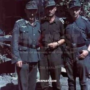 German wehrmacht supply officers in tropical uniform, caps, boots, smoking, repair truck, Anzio Italy 1944.