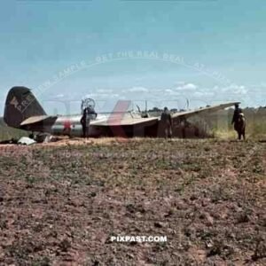 Germans capturing crash landed Russian Ilyushin IL-4 Bomber. Crew standing beside plane. 3rd Panzer Division, Beresina 1941.