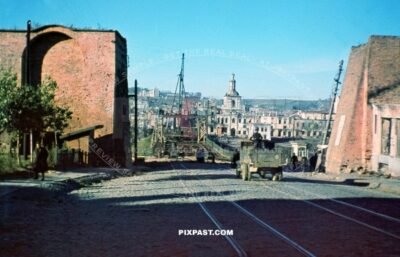 Germans driving captured Russian GAZ truck beside repaired bridge in Smolensk Russia September 1941