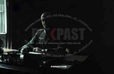 Germany army doctor in office, Munich, 1940. Stationary, table.