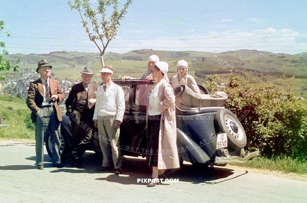 Germany family with black car from Rheinprovinz go on summer holiday 1938. Idar Oberstein. the Felsenkirche.