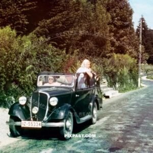 Germany family with black car from Rheinprovinz go on summer holiday 1938. Idar Oberstein. the Felsenkirche.
