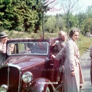 Germany family with red car from Rheinprovinz go on summer holiday 1938. Idar Oberstein. the Felsenkirche.