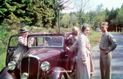 Germany family with red car from Rheinprovinz go on summer holiday 1938. Idar Oberstein. the Felsenkirche.