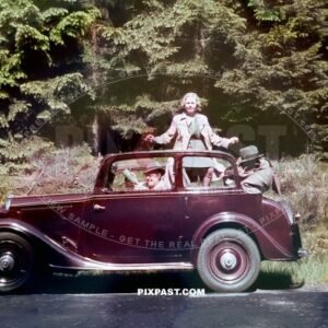 Germany family with red car from Rheinprovinz go on summer holiday 1938. Idar Oberstein. the Felsenkirche.