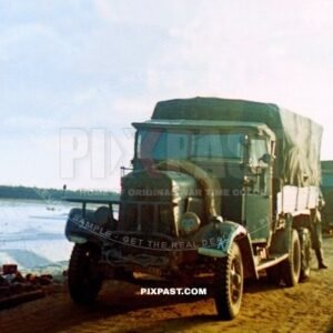 Germany heavy army truck driving towards Moscow with gas mask on the night lights. Gzhatsk Gagarin 1942