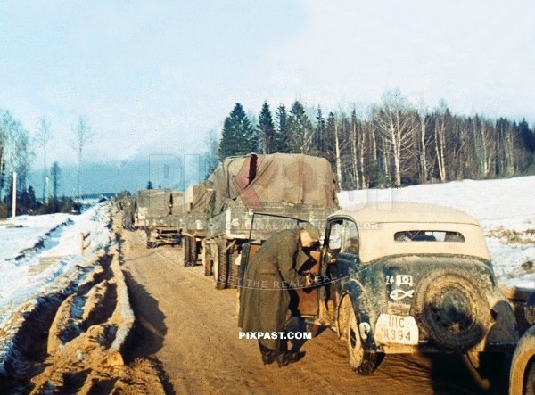 Germany heavy army truck driving towards Moscow with gas mask on the night lights. Gzhatsk Gagarin 1942