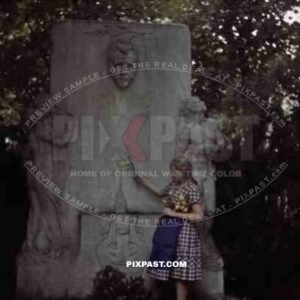 Girl at the Hugo Wolf tomb at the Vienna Central Cemetery, Austria 1939