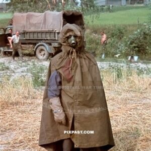 Hauptmann Heinz Jarmer dressed in zeltbahn jacket with gas-mask and gloves in Russia 1941. 3. Panzer Brigade. 3RD Panzer