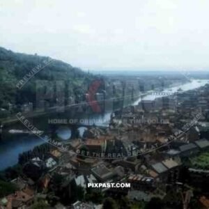 Heidelberg city 1945, Showing River Neckar beside Heiliggeistkirche Church and bombed Alte Brucke Bridge.