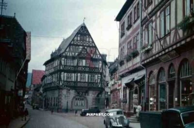 Heiliggieststrasse, Heidelberg Germany, 1937, August Müssig, shops, old timers, vintage cars and trucks,