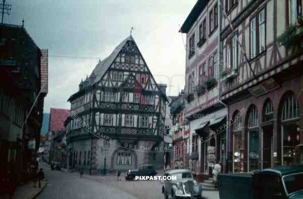 Heiliggieststrasse, Heidelberg Germany, 1937, August Müssig, shops, old timers, vintage cars and trucks,