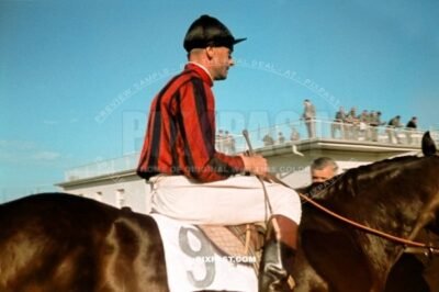 Horse Racing Jockey Nr. 9 in Deutsches Derby Hamburg Horn Rennbahn race course. June 1939