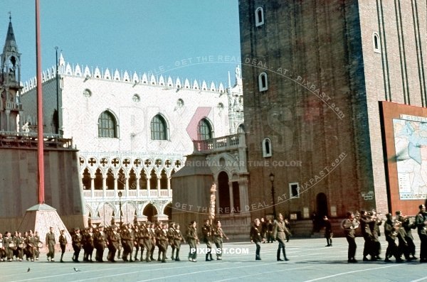 Italian army parade in St. Marks Square Piazza San Marco in Venice, Italy 1942. Doges Palace and St Marks Campanile