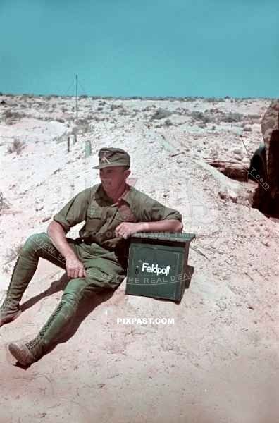 Kappler with his Feldpost Military Post Box beside a Radio Antenna unit.Tripoli February 1941. 2. Panzer Nachrichten Abt.