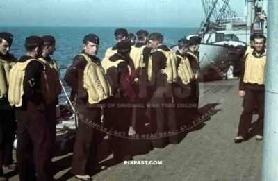 Kriegsmarine seamen with life vests on the deck of a warship at the french Atlantic coast 1941