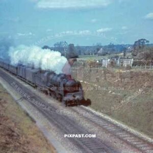 Large German troop transport Locomotive moving soldiers between Halle and Leipzig. Germany 1940