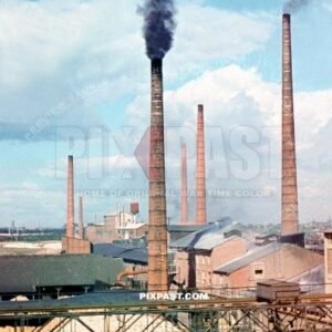 Large cement factory in Austria 1939. Large smoke stacks chimneys. Klagenfurt am Worthersee