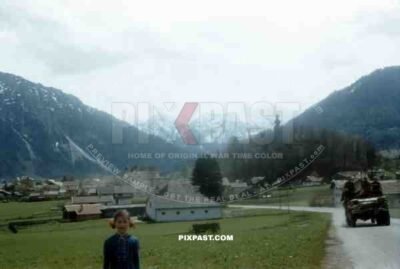 Little Bavarian Girl welcomes American GIs of the 101st Cavalry Regiment in Ruhpolding Bavaria 1945