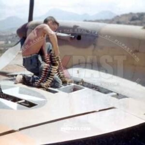 Loading ammunition into a Spitfire Mk V (trop) WZ-J JL237. 309th Fighter Squadron of the 31st Fighter Group. Sicily 1943.