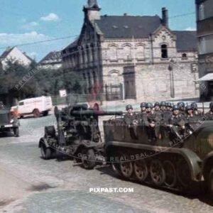 Luftwaffe Half-Track tows 88mm flak cannon pass Goldene Sieben Shop in Halle Salle Germany 1939
