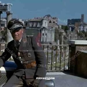 Luftwaffe flak officer with Krim Shield of the Leichte Flak Abteilung 99 (mot) in Rome Italy 1944 with staff car.